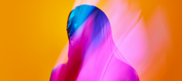 Portrait with pink and blue light streaks