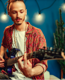 Person playing electric guitar